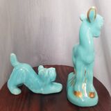 Pair of turquoise zoomorphic statuettes
