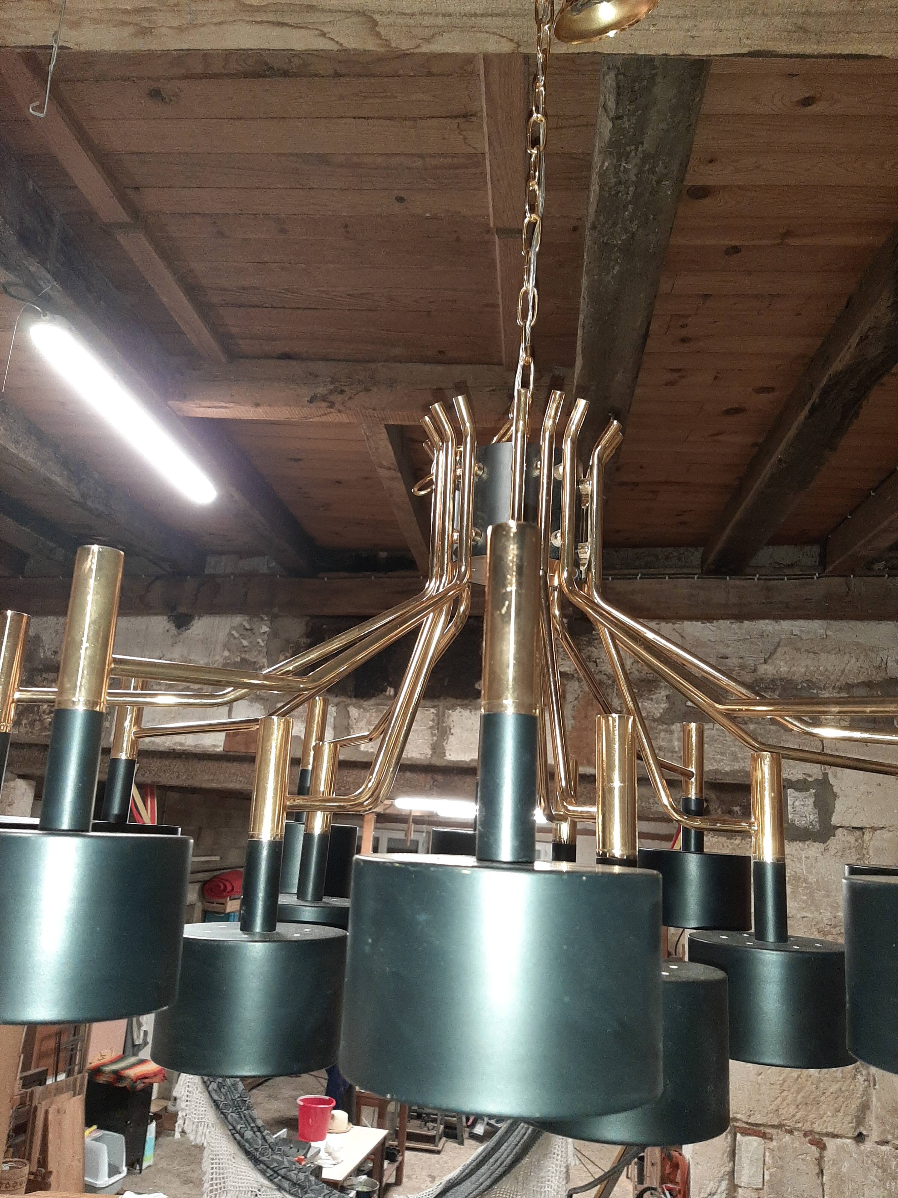 Black chandelier and gilded metal