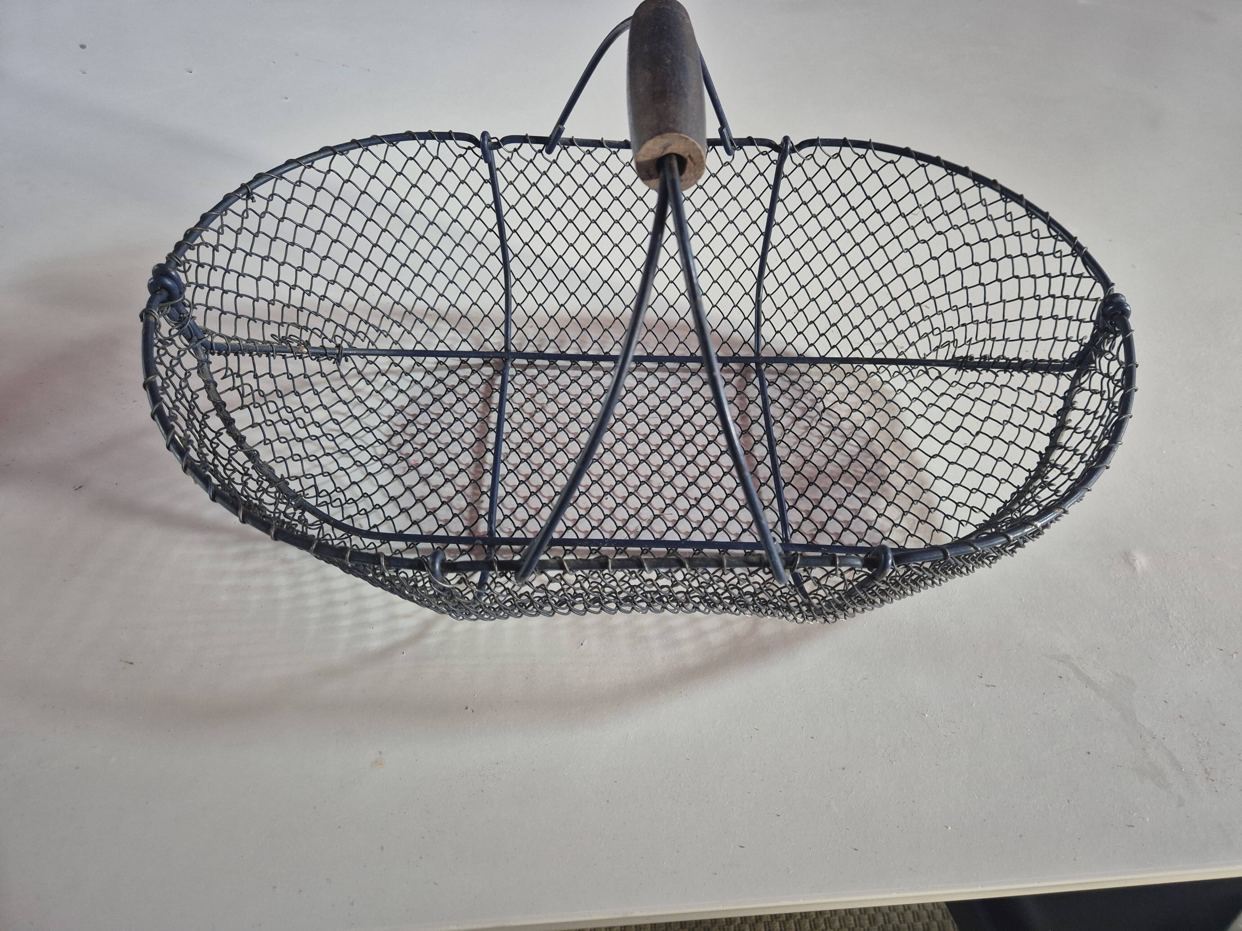 Vintage navy blue metal basket with wooden handle