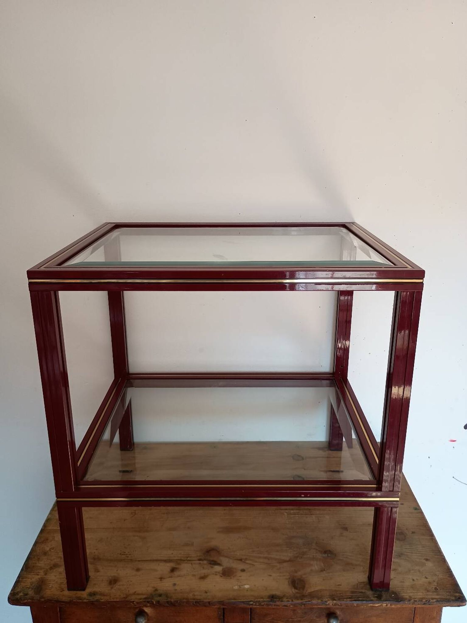 Side table in glass and brass