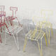 Vintage multicolor stackable wire chairs