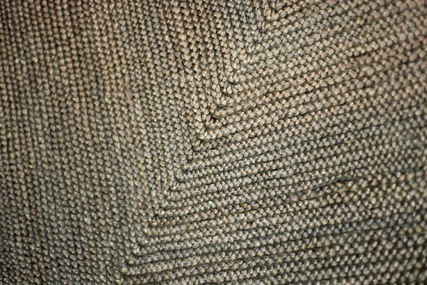 Brown flat-woven jute Indian rug, 1970.