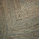 Brown flat-woven jute Indian rug, 1970.