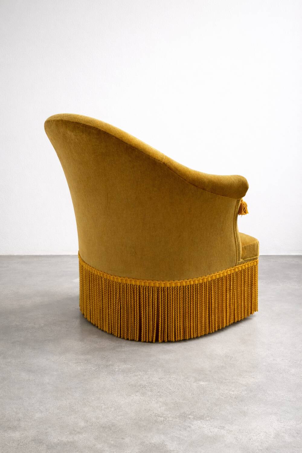 Mustard velvet armchair