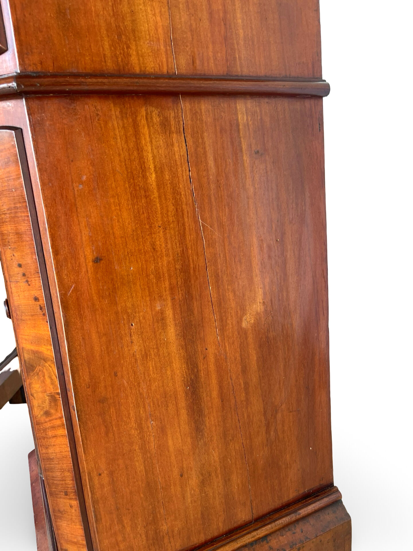 A pair of antique walnut bedside tables from the 1890s.