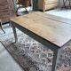 Coffee table with sandblasted top and painted legs.