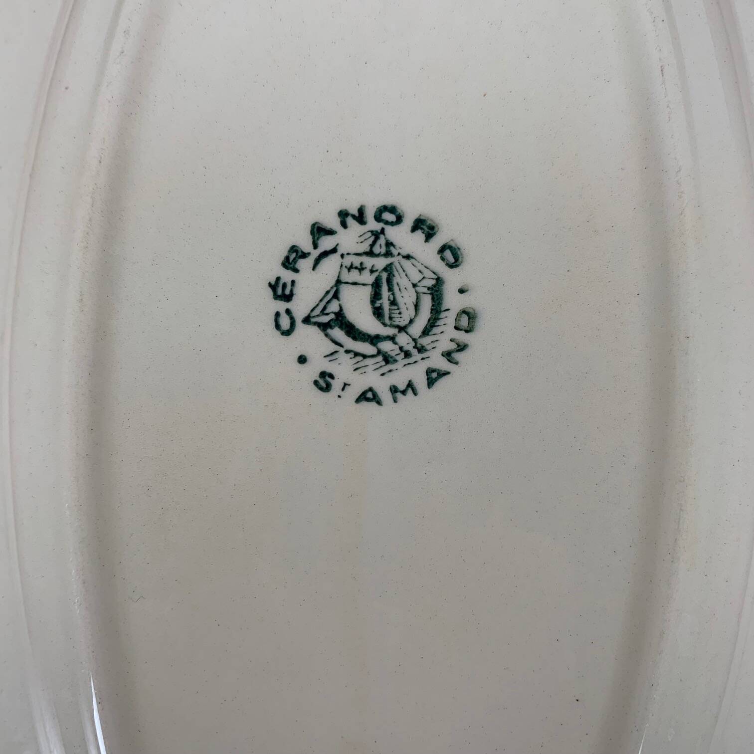 Small St Amand Ceranor dish, dark green flower pattern