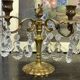Pair of bronze chandeliers with crystal drops from the 1960s