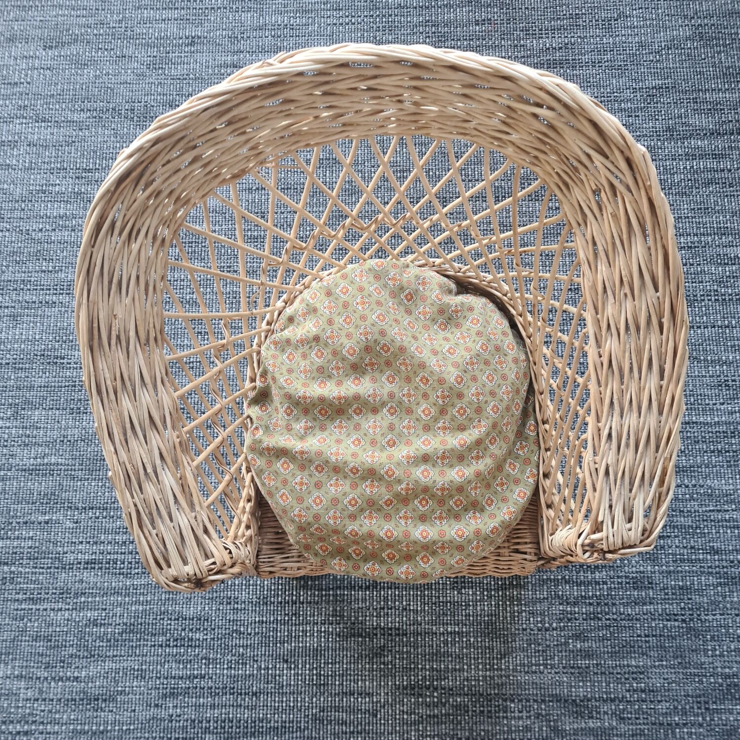 Rattan armchair with cushion