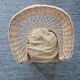 Rattan armchair with cushion