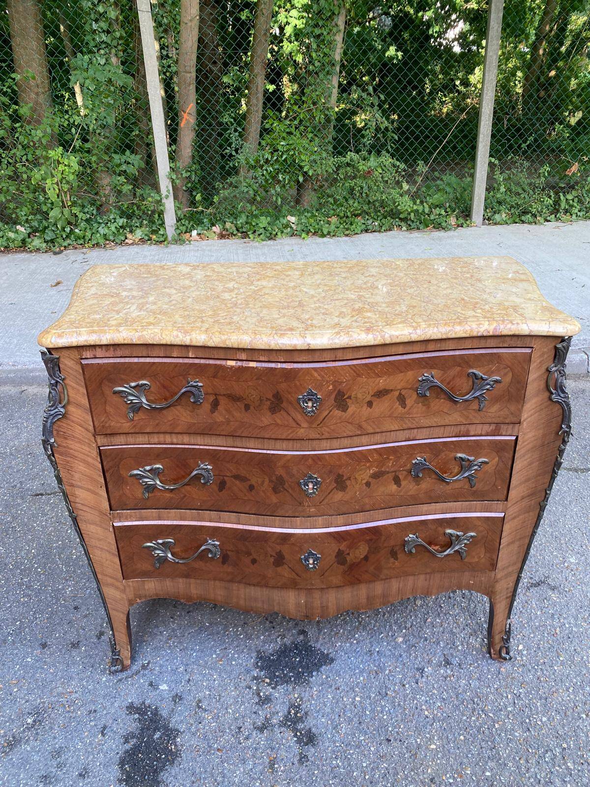 Curved Louis XV chest of drawers in marquetry and beige marble