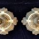 Pair of antique carved bronze candlesticks.