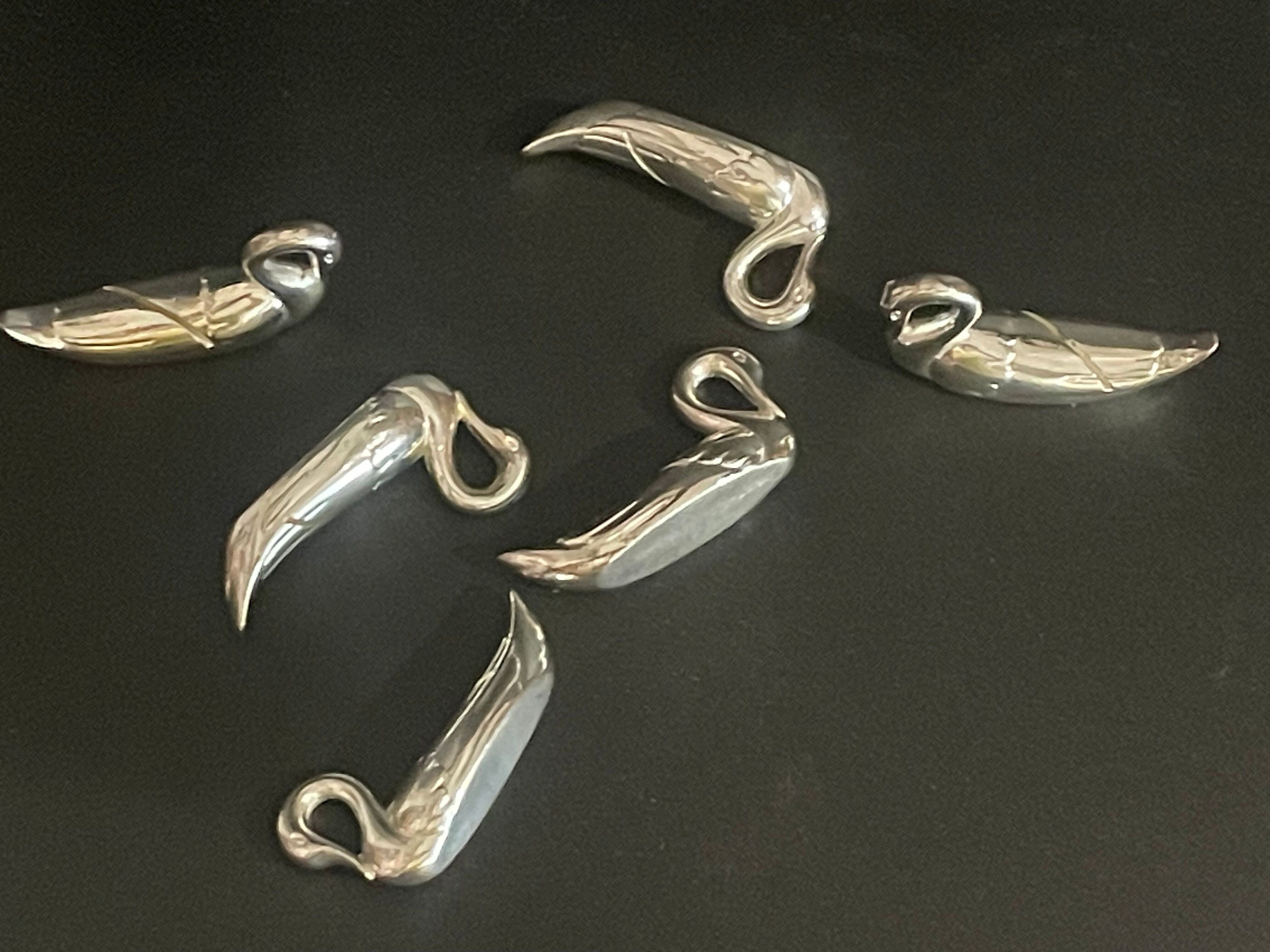 Set of 6 silver metal knife holders for table