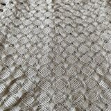 Old ecru white bedspread
