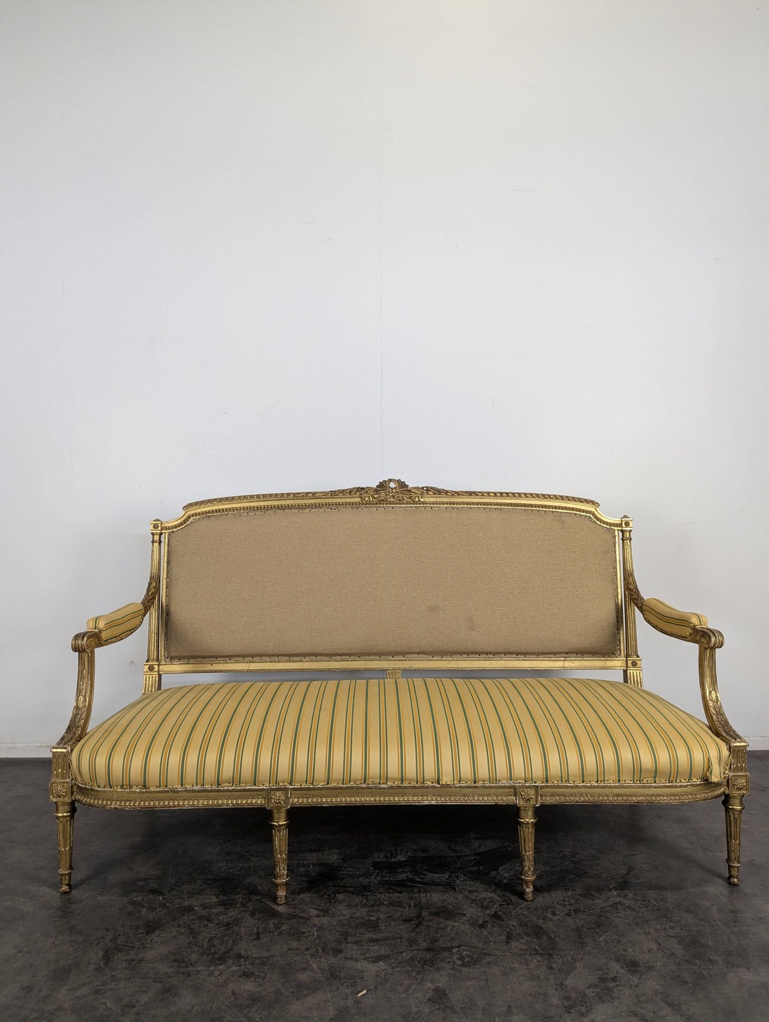 Louis XVI style canapé from the Napoleonic III era in gilded wood.