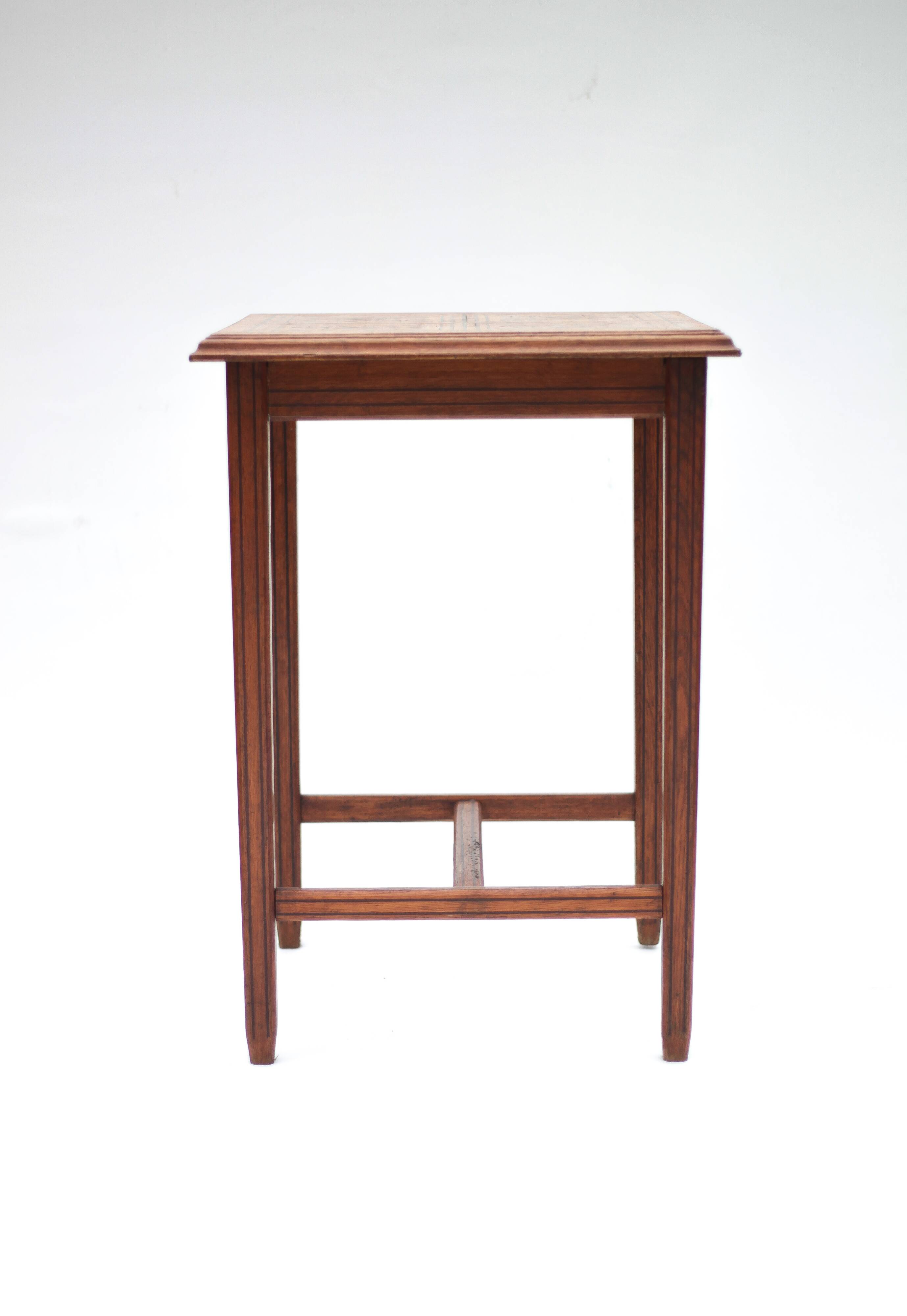 Wood table with marquetry, table with an antique parquet top, antique table.