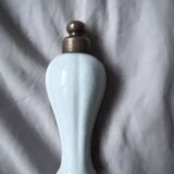 Brass door handle and Limoge porcelain