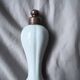 Brass door handle and Limoge porcelain