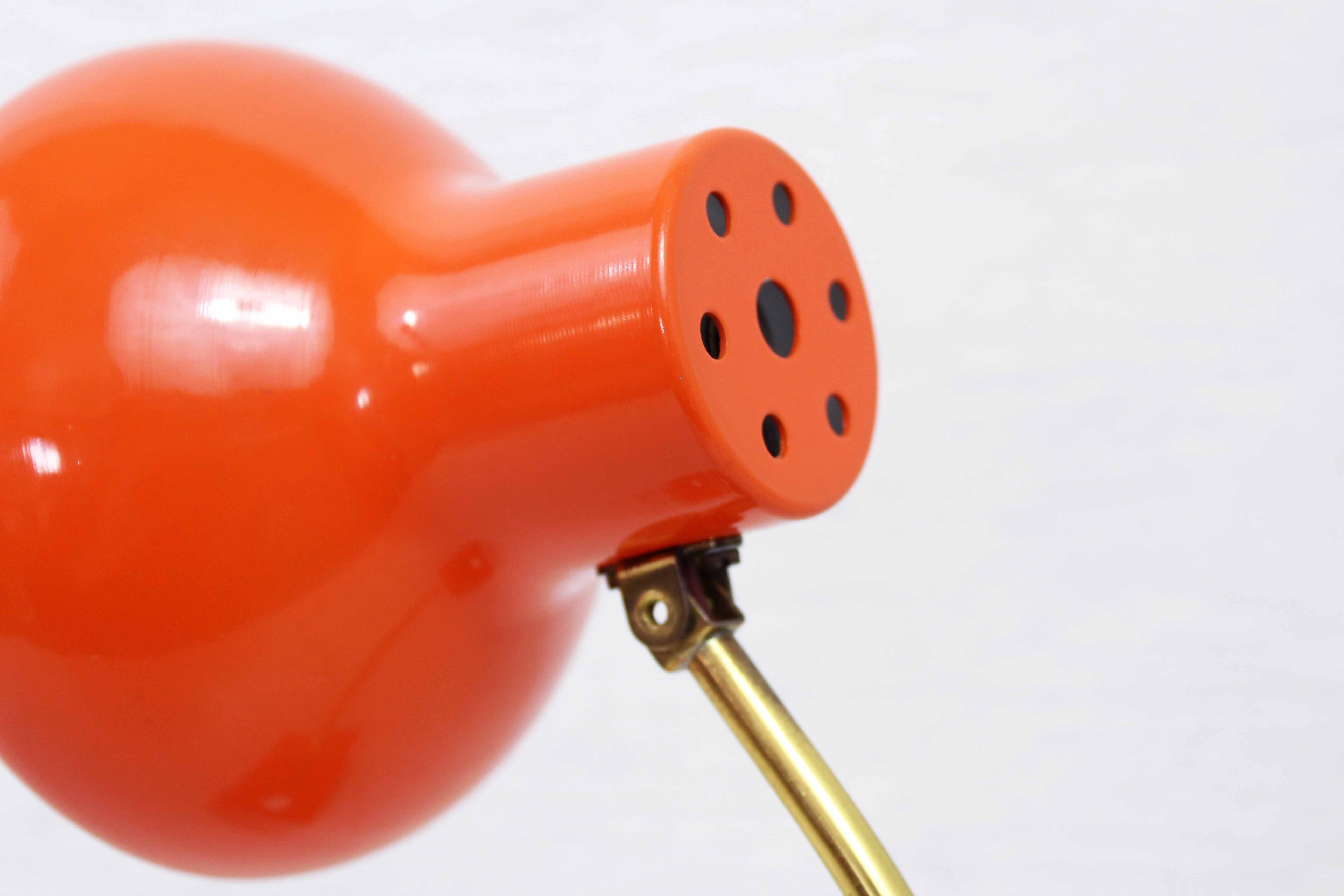 Vintage lamp in orange metal