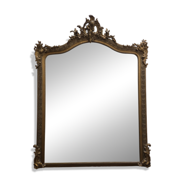 Large gilded mirror and cherub