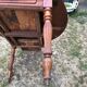 Louis Philippe oval drop-leaf table in solid cherry wood with 2 drawers.