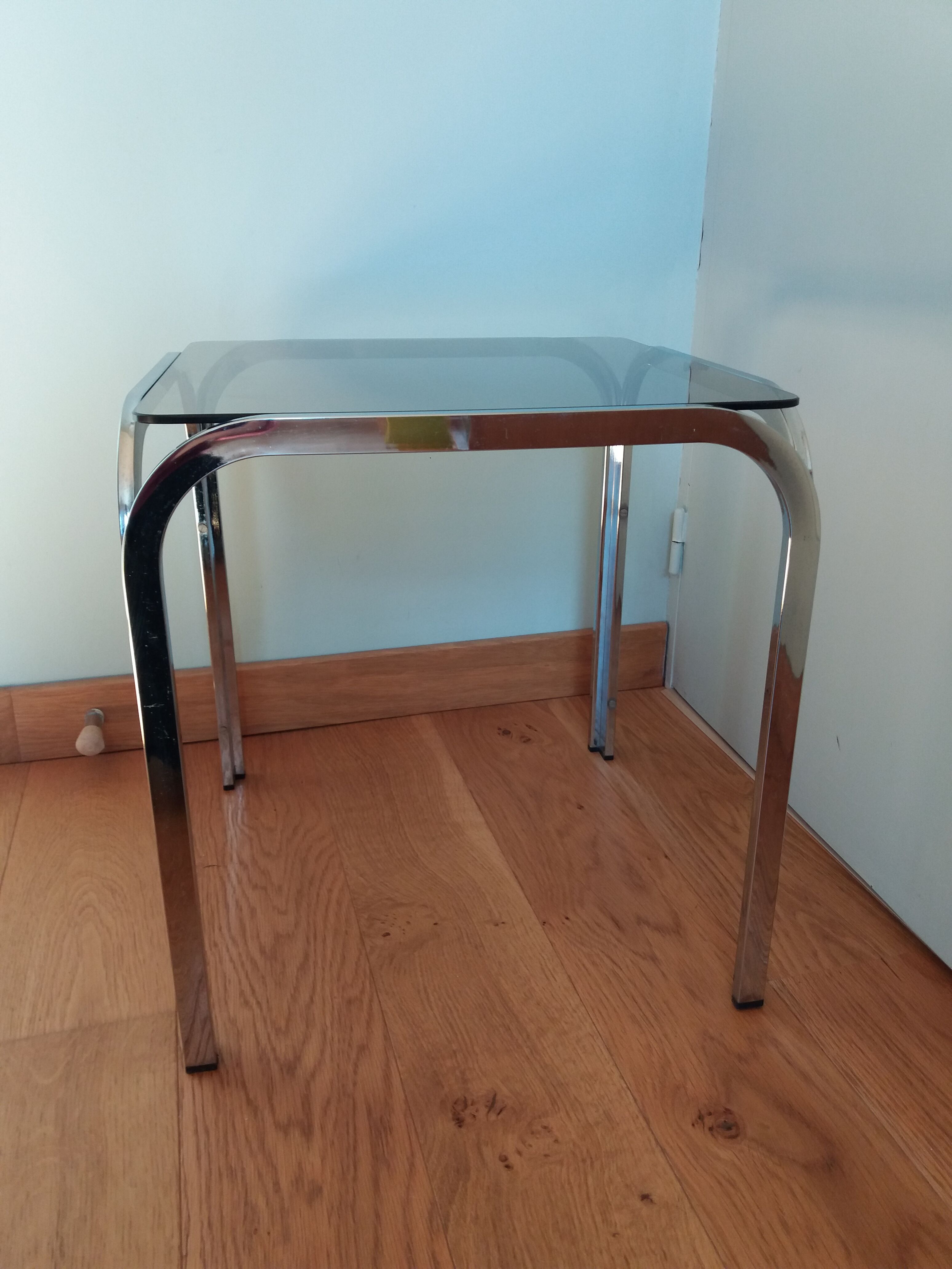 Square coffee table in chromed metal and smoked glass