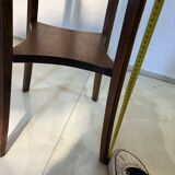 Vintage dark wood side table with curved base