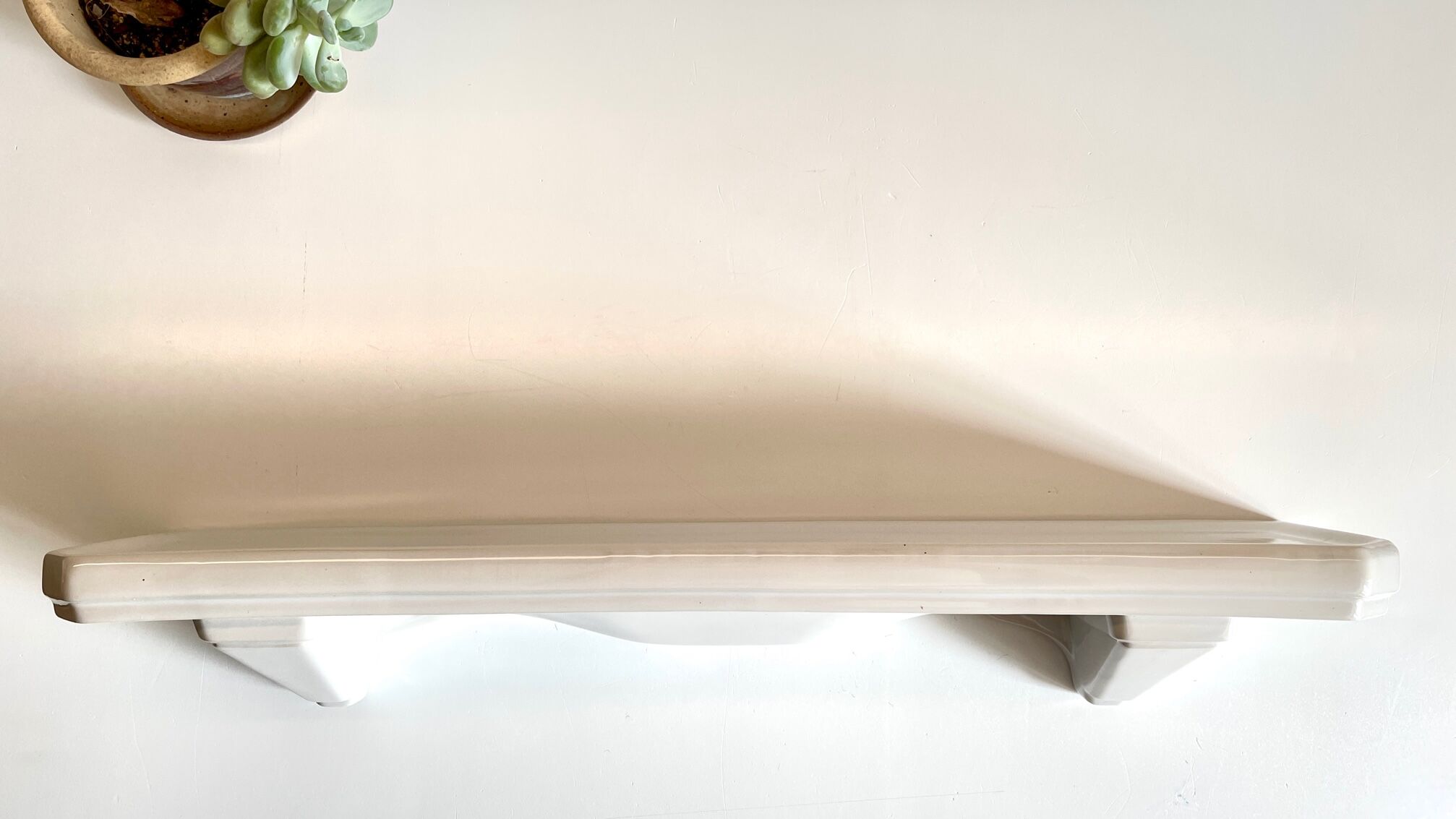 Vintage ceramic wall shelf