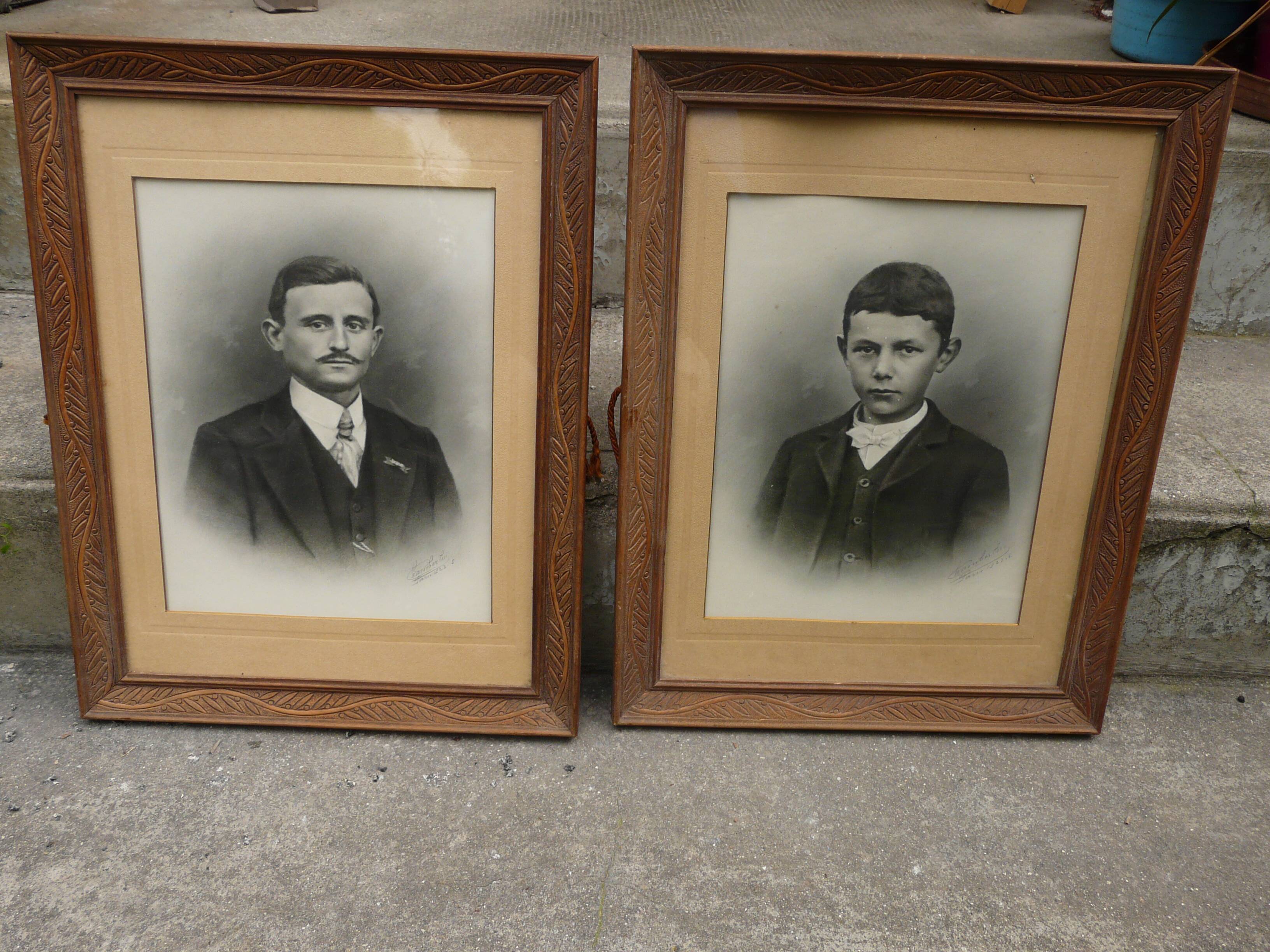 Pair of wooden frames with signed photos, 1923
