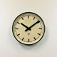 Grey industrial factory wall clock from pragotron, 1960s