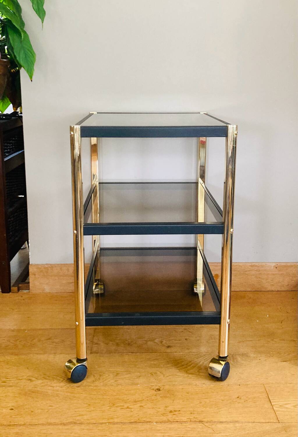 Side table in gold metal and smoked glasses 1970s