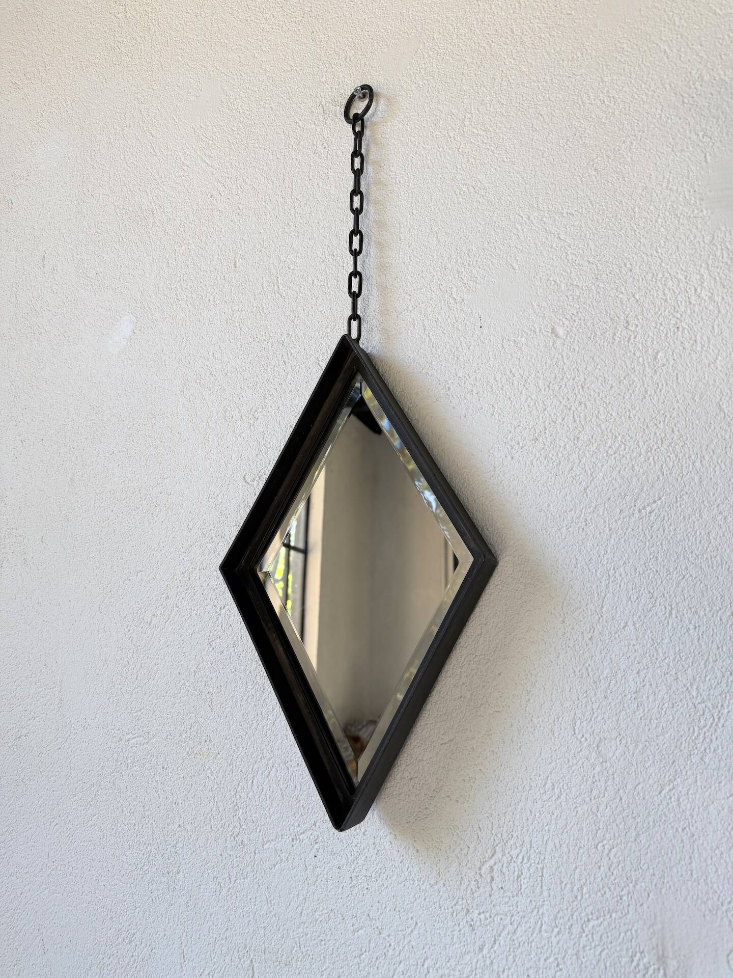 Miroir brutaliste losange en fer