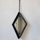 Miroir brutaliste losange en fer