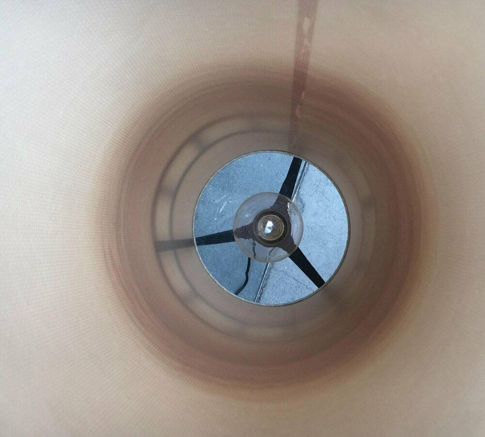 Mid-century tripod rocket floor lamp from the GDR of East Germany by Leuchtenbau Saller, 1960s.