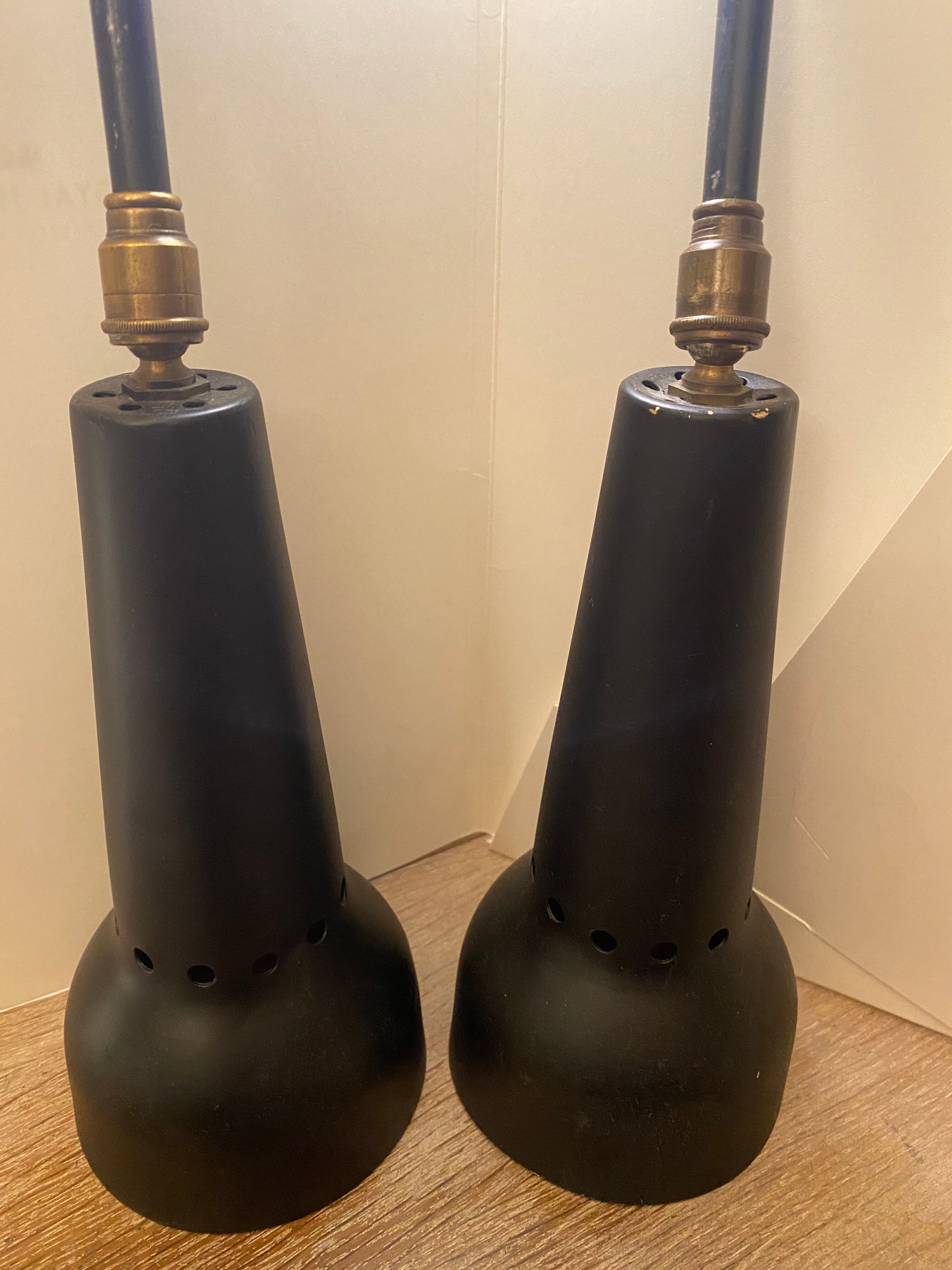 Pair of black metal spots