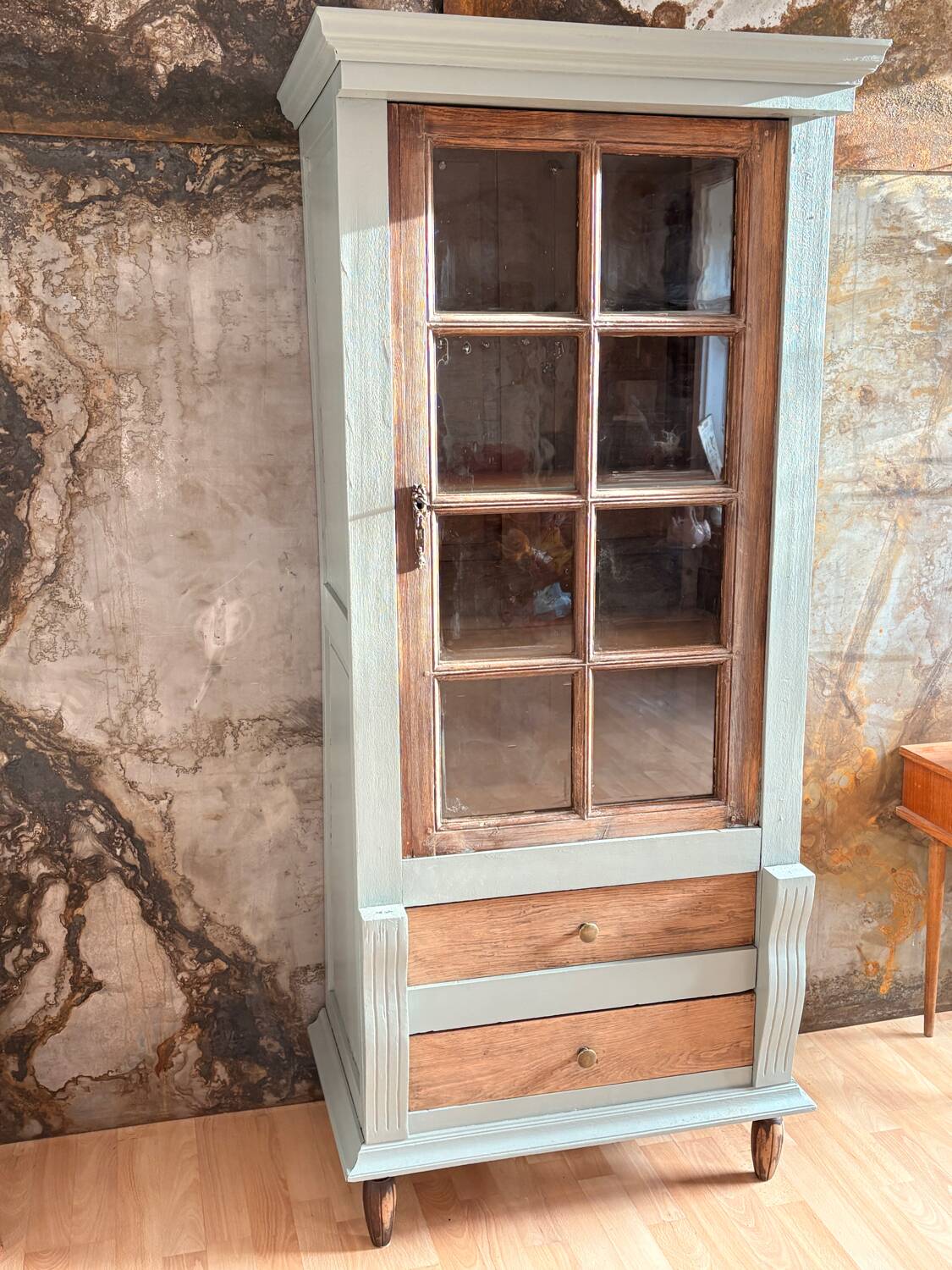 Raw wood and celadon glass cabinet