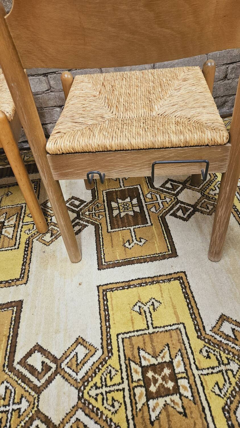 4 straw chairs in the vintage Charlotte Perriand 1970 style