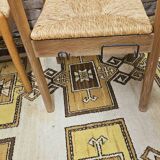 4 chaises en paille dans le style Charlotte Perriand 1970 vintage