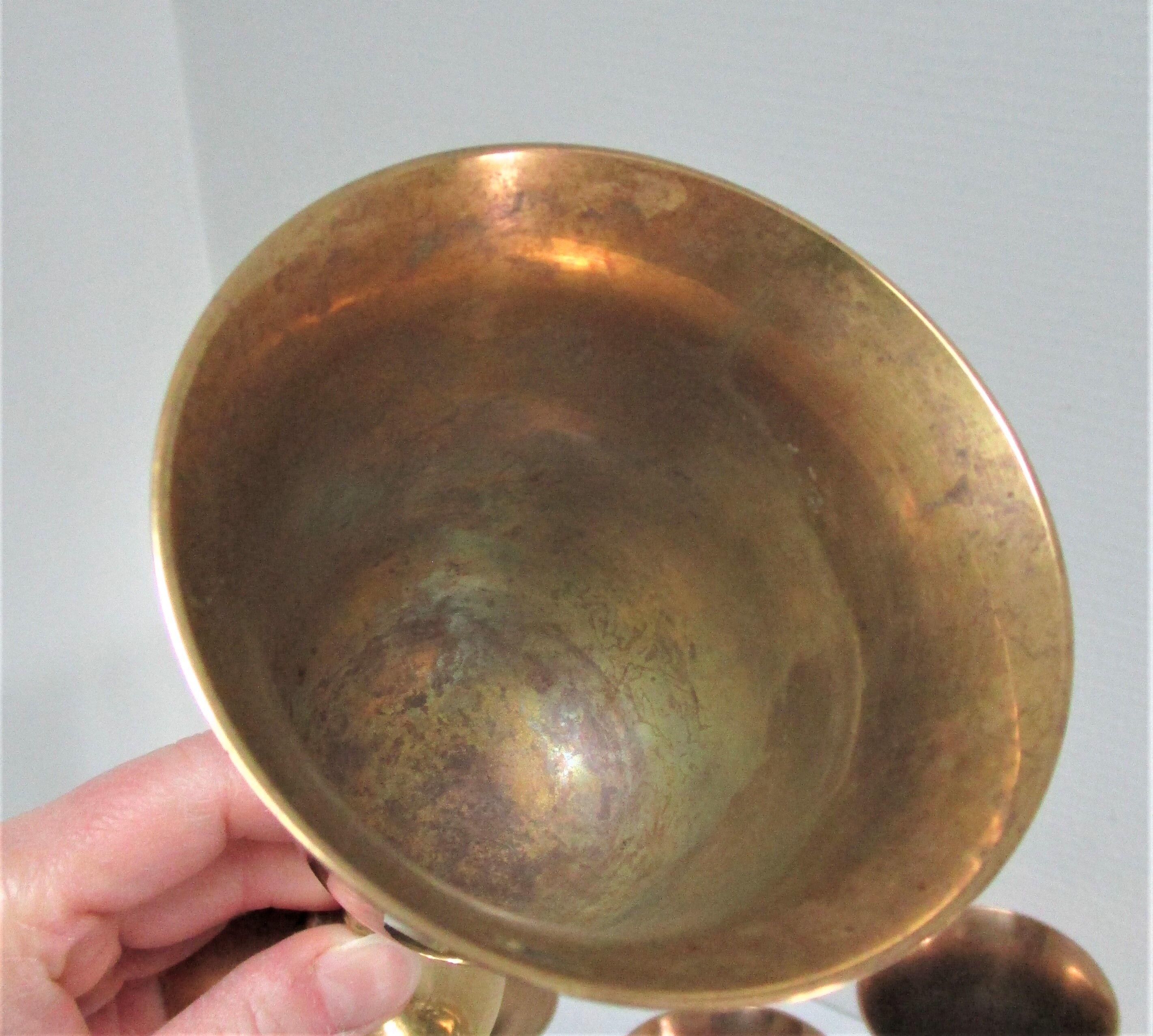 Set of eight vintage solid brass walking glasses