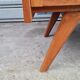 Commode vintage pied compas et rotin