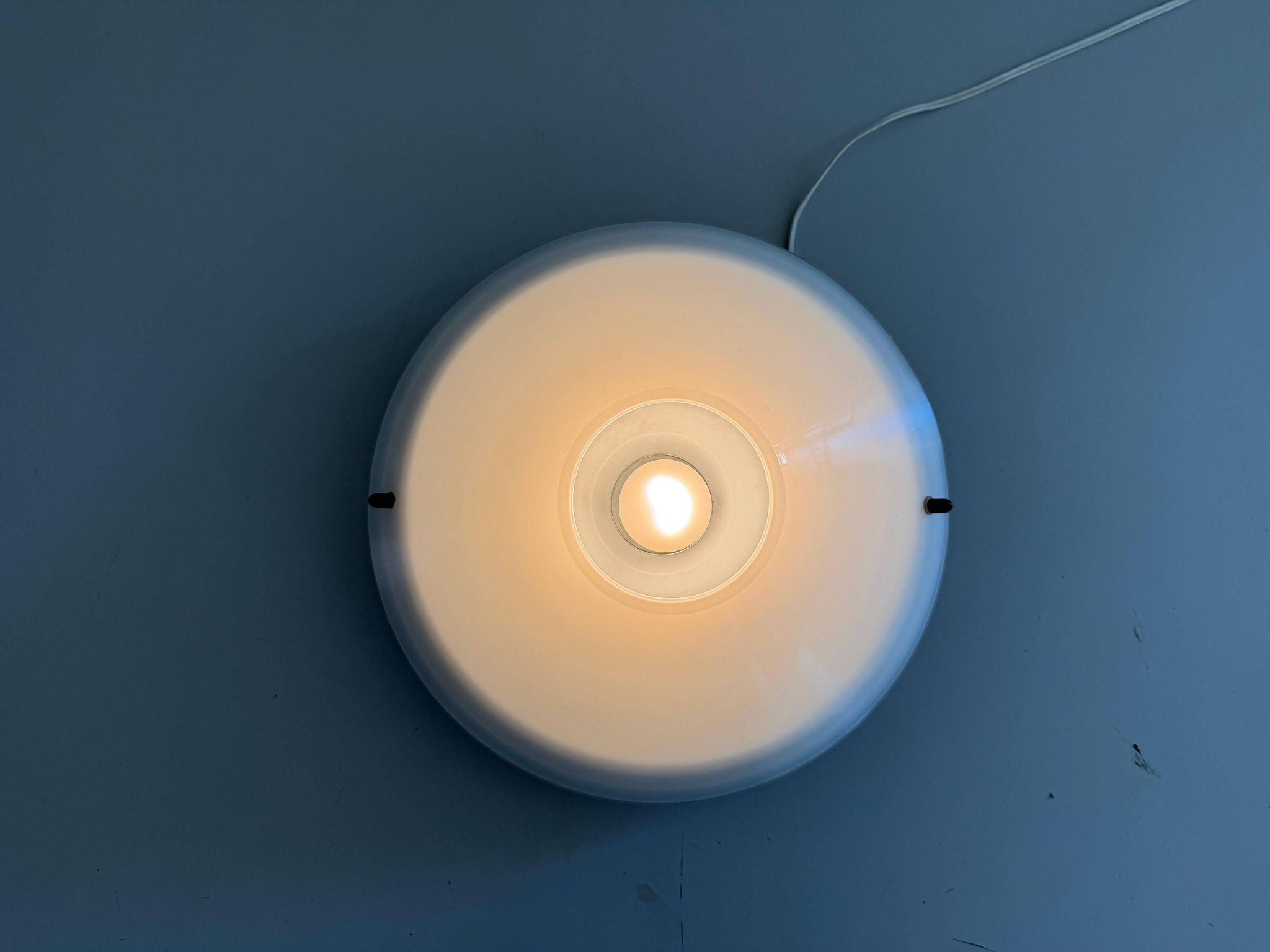 Simple opal glass wall light from the mid-century by Lamperti, 1960s, Italy.