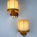 Pair of articulated "Cocoon" wall lights, resin and pine, Italy, 1970s