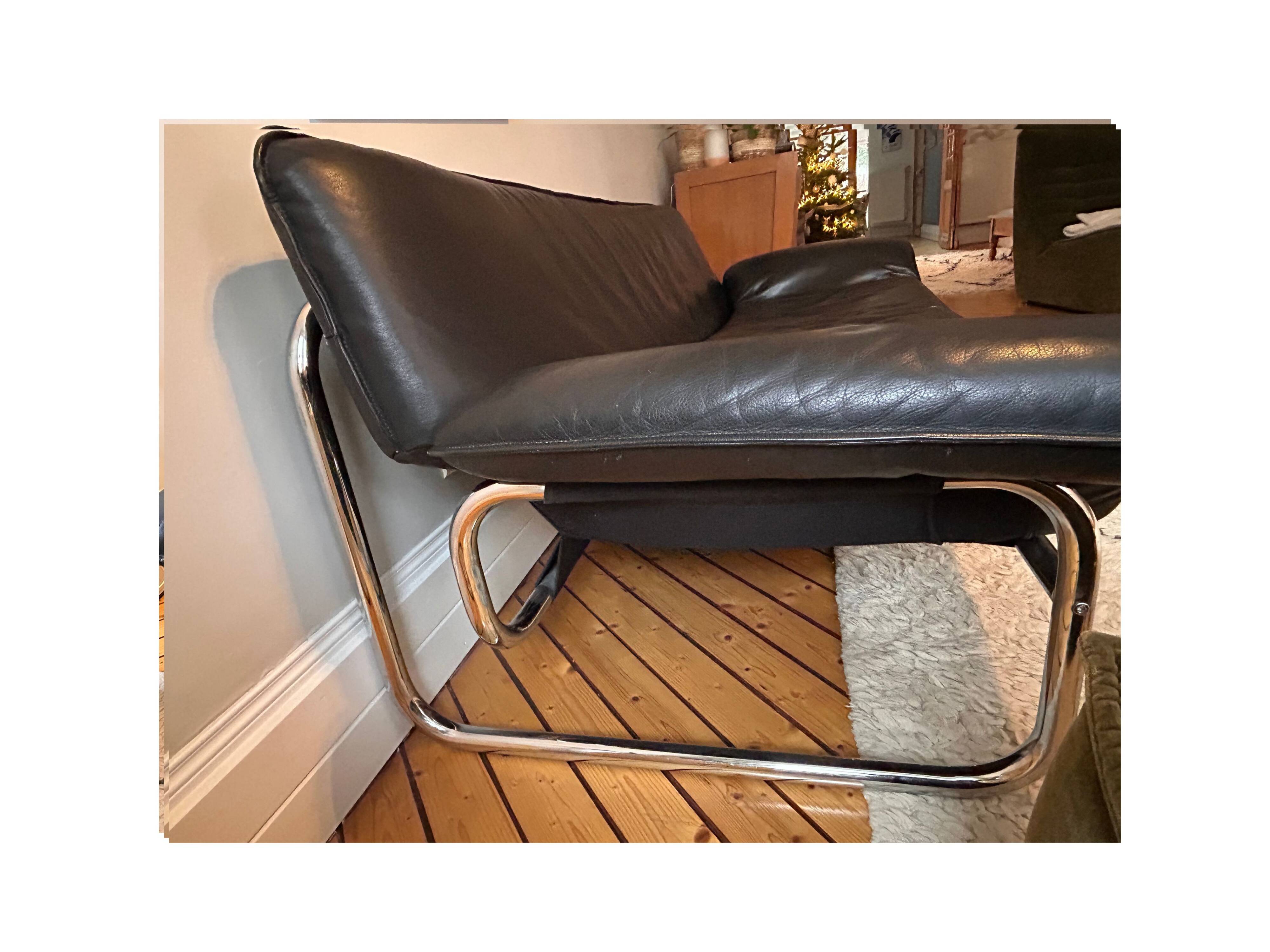 Black leather sofa designed by Johan Bertil Häggström