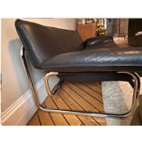 Black leather sofa designed by Johan Bertil Häggström