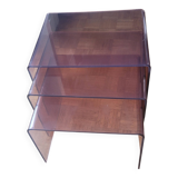 Trio of 70s smoked plexiglass nesting tables