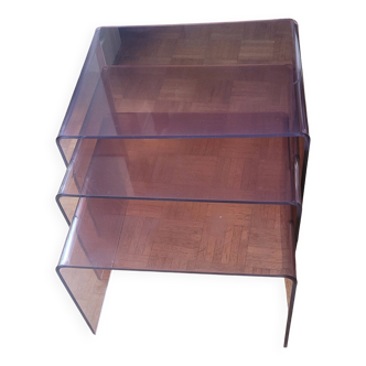 Trio of 70s smoked plexiglass nesting tables