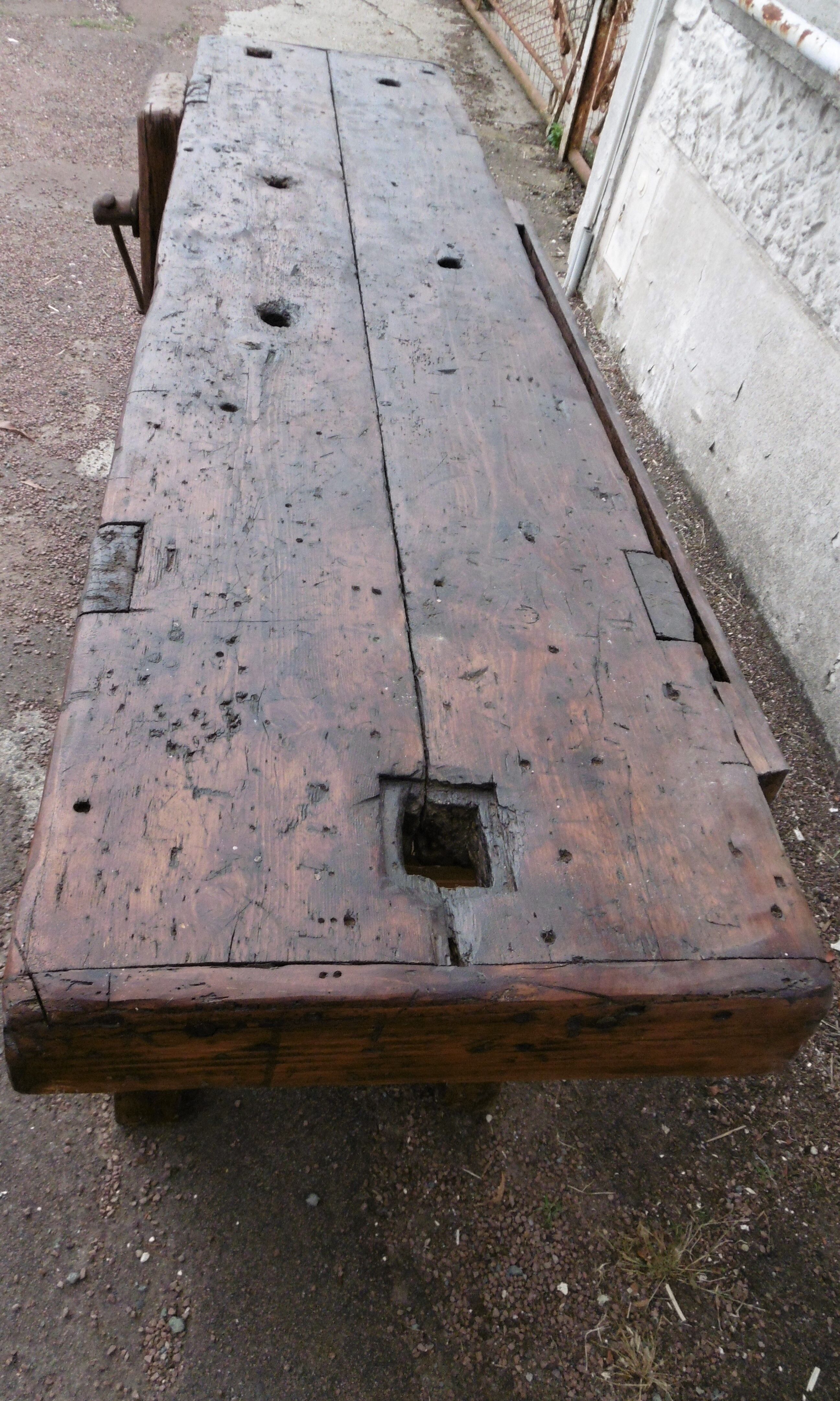 Workbench in raw wood with the press