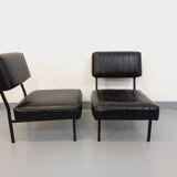 Set of 2 vintage modernist armchairs in black faux leather and metal.