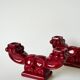 Pair of large burgundy ceramic candlesticks, 1950