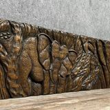 Central Africa 20th century: carved wooden panel in bas-relief of elephants